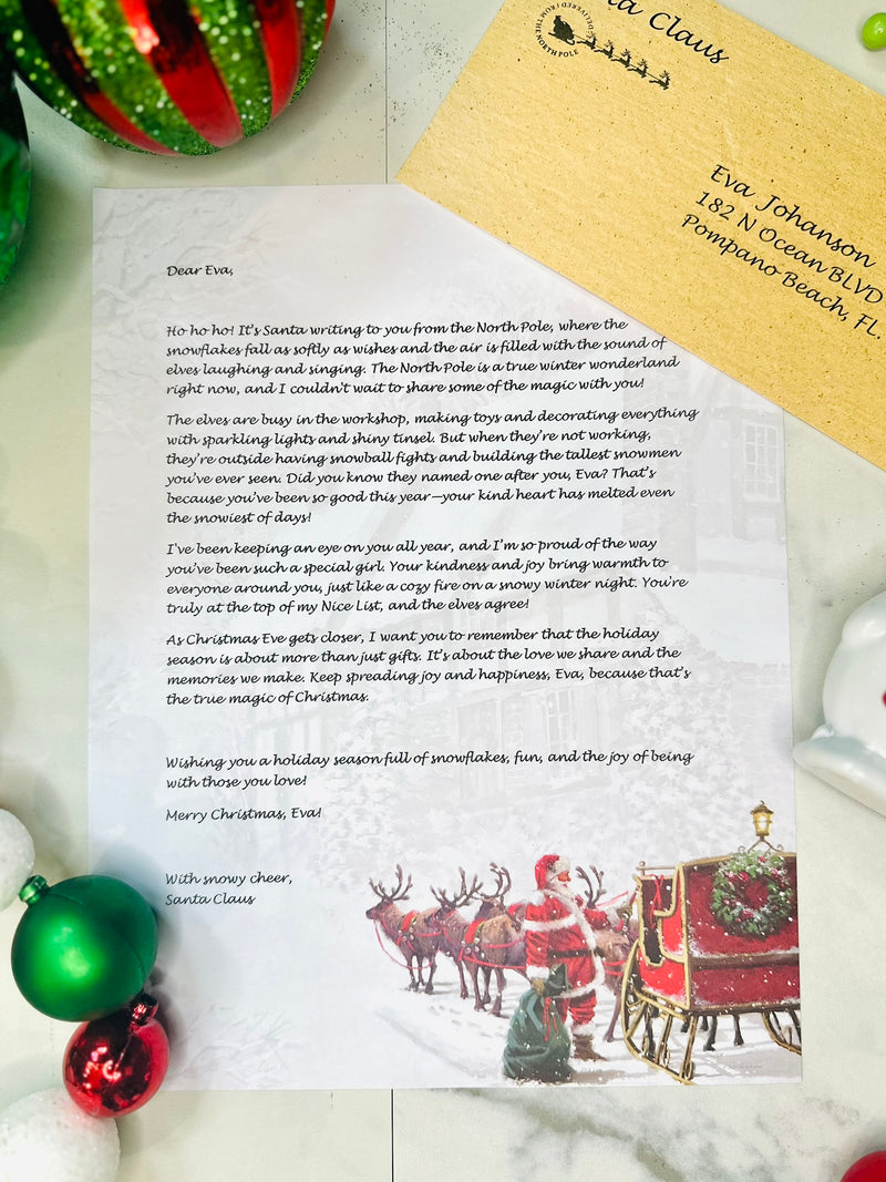 Sample of premium Santa letterhead designs spread on a wooden desk